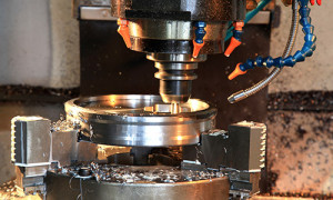 An image of a lathe, machining